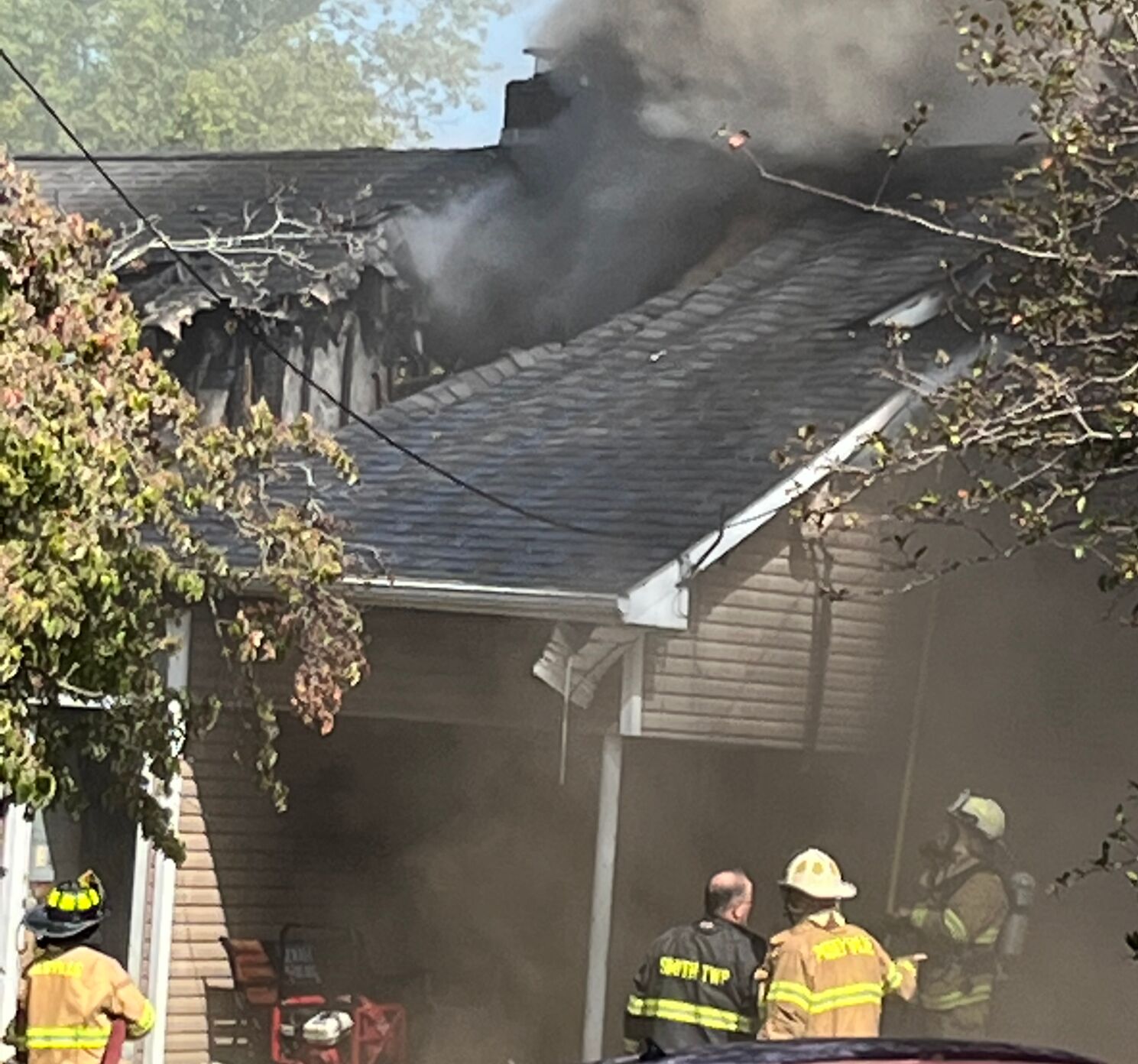 Multiple departments battling large house fire in Posey County